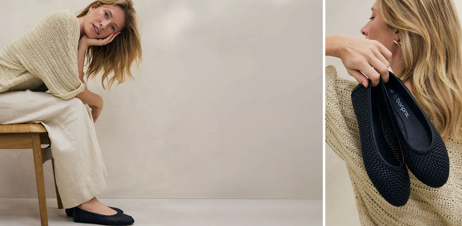 Pull chaud en maille couleur crème et pantalon large en lin pour un look confortable et élégant.